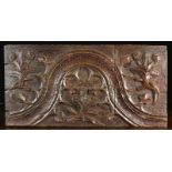 A 16th Century Oak Fragment Rail composed of two parts carved with an undulating band enriched with