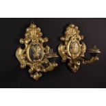 A Pair of 18th Century Carved, Painted and Gilded Wooden Wall Sconces.