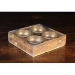 An Antique Oak Till Box inset with four brass hemispherical dishes, 2" (5 cm) high,