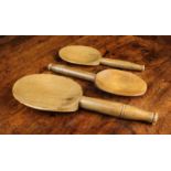 Three 19th Century Treen Spoons, probably beechwood, with oval paddle bowls on turned handles,