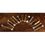 A Collection of 14 Antique Brass Pastry Wheel Cutters and crimpers; two with wooden handles,