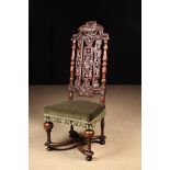 A Fine Late 17th/Early 18th Century Carved Walnut Daniel Marot inspired High Back Chair.