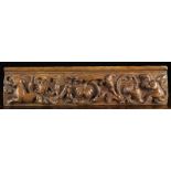 A Late 16th/Early 17th Century Oak Frieze Rail carved in relief with an undulating trail of