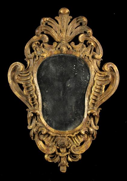 An 18th Century Carved Giltwood Girandole Mirror.