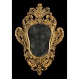 An 18th Century Carved Giltwood Girandole Mirror.
