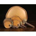 Five 19th Century Copper Pan Lids with riveted handles, 12½" (32 cm), 6¾" (17 cm), 5¾" (14.