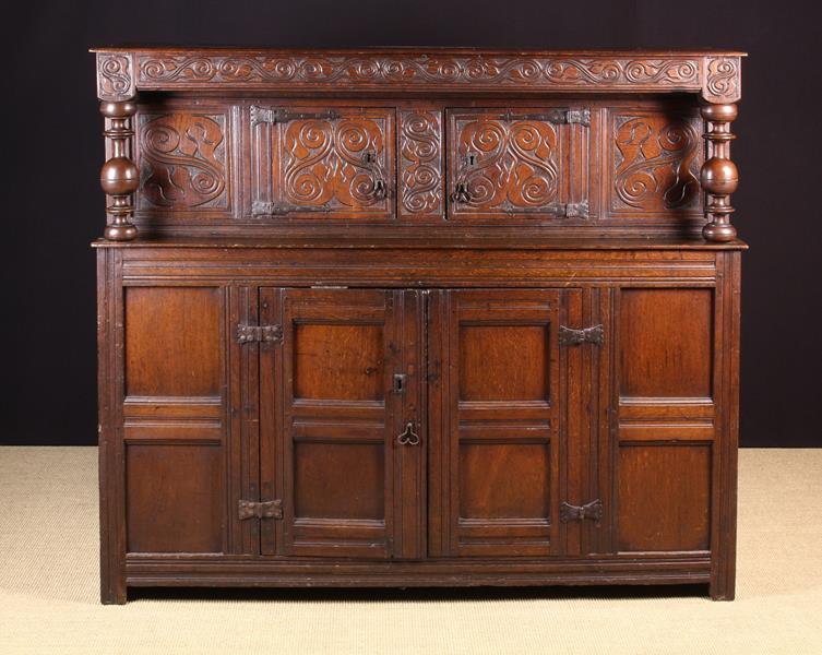 A 17th Century Oak Court Cupboard.