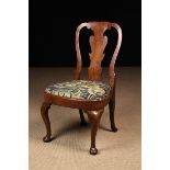A Queen Anne Walnut Side Chair.