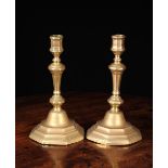 A Pair of 18th Century English Knopped Octagonal Brass Candlesticks, 9½" (24 cm) in height.