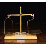 A Set of Wood & Brass Postal Scales by Arnold Precision of Redhill, Surrey with five brass weights,