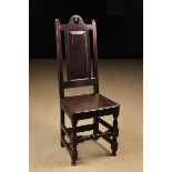 An Early 18th Century Joined Oak High-backed Side Chair.