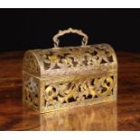 An 18th Century Ornamental Fretted Brass Casing for a small domed topped casket.