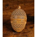 A 19th Century Carved Cocquilla Nut Pomander.