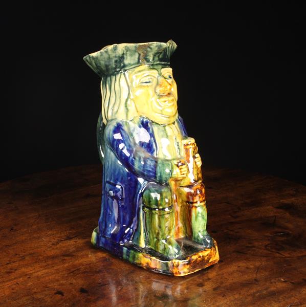 A Large 19th Century Toby Jug dripped in blue, green and brown glaze, 11" (28 cm) in height. - Image 3 of 3