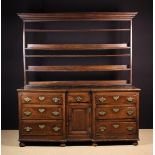 A Large 18th Century Oak Enclosed Dresser with Rack (A/F).