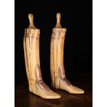 A Pair of Vintage Wooden Boot Lasts with padded leather panels,