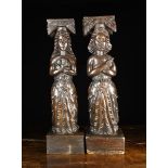 A Pair of Late 16th Century Oak Oak Figural Supports,