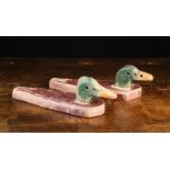 A Pair of Naively Made Painted Pine Decoy Ducks with swivelling heads and flat shaped plank bodies,