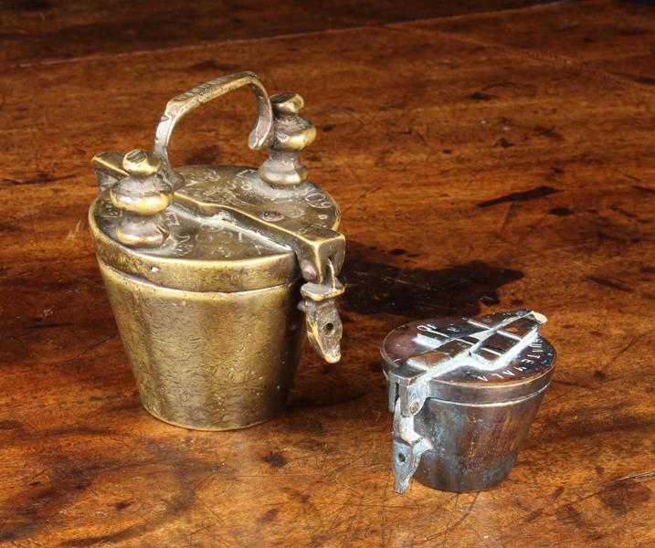 Two Sets of Antique Bronze Nesting Weights: The largest incomplete with five stacking cup weights