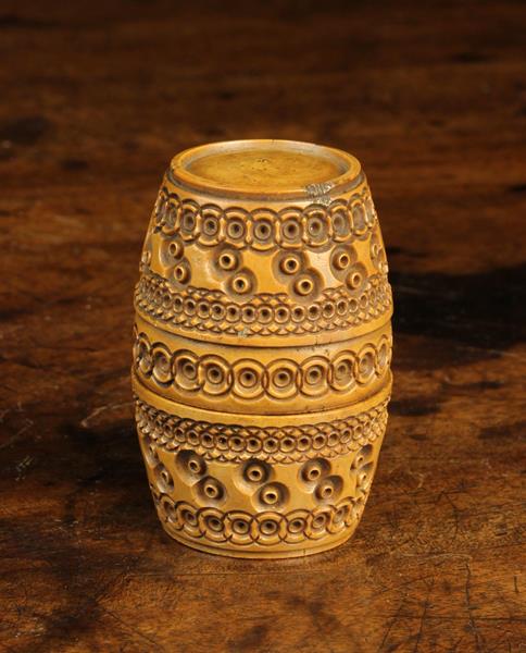 A 19th Century Carved Cocquilla Nut Barrel Shaped Container,