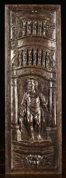 A Fine 16th Century Carved Oak Panel of rich colour and patination,