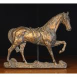 A Relief Cast Iron Wall Mount in the form of a Horse, 11½" (29 cm) high, 13" (35 cm) in length.
