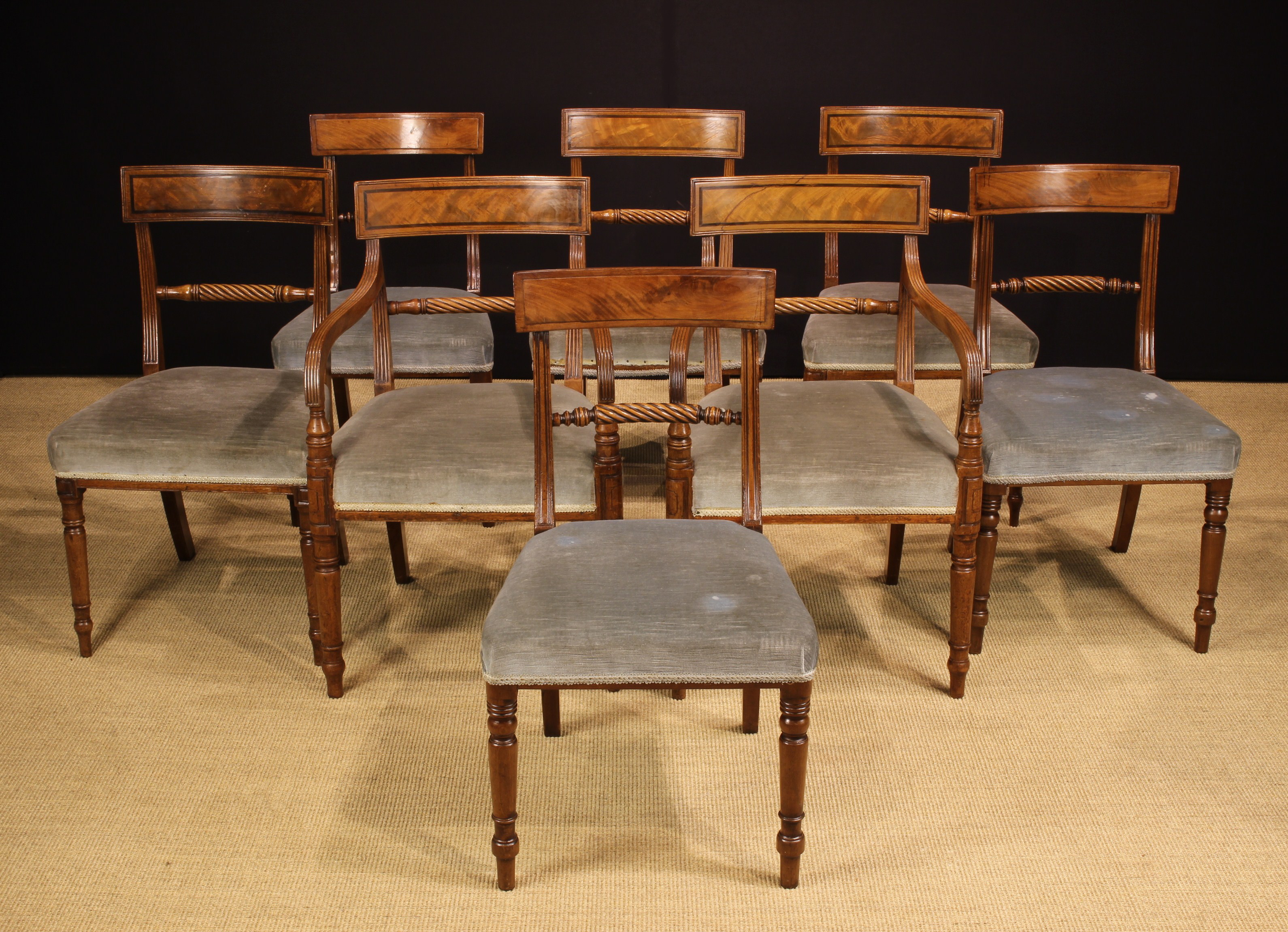 A Harlequin Set of Eight George IV Mahogany Dining Chairs including two matched Carvers.