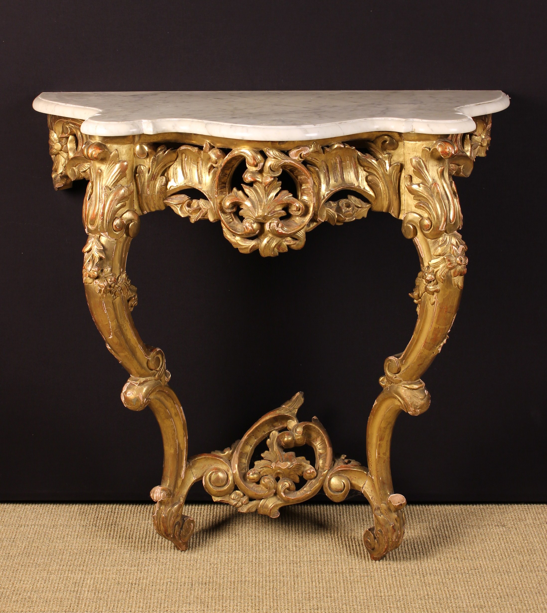 A Louis XV Style Carved Giltwood Console Table.