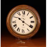 A Round Oak Cased Smiths Empire Wall Clock.