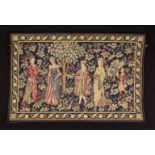 A French Machine-Woven Tapestry Wall Hanging depicting figures in a medieval garden;