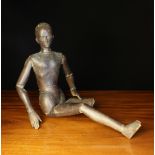 A 19th Century Treen Lay Figure with carved features to the head, carved hands,