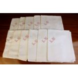 A Set of Eleven Large White Damask Table Napkins reputed to have come from the Royal Apartments of