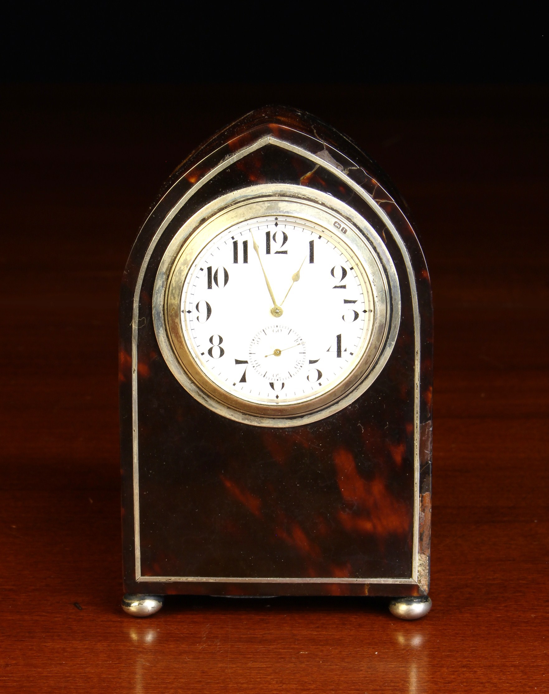 An Attractive Silver Mounted Tortoiseshell Clock, Circa 1908.