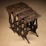 A 19th Century Quartetto of Lacquered Chinoiserie Nesting Tables.