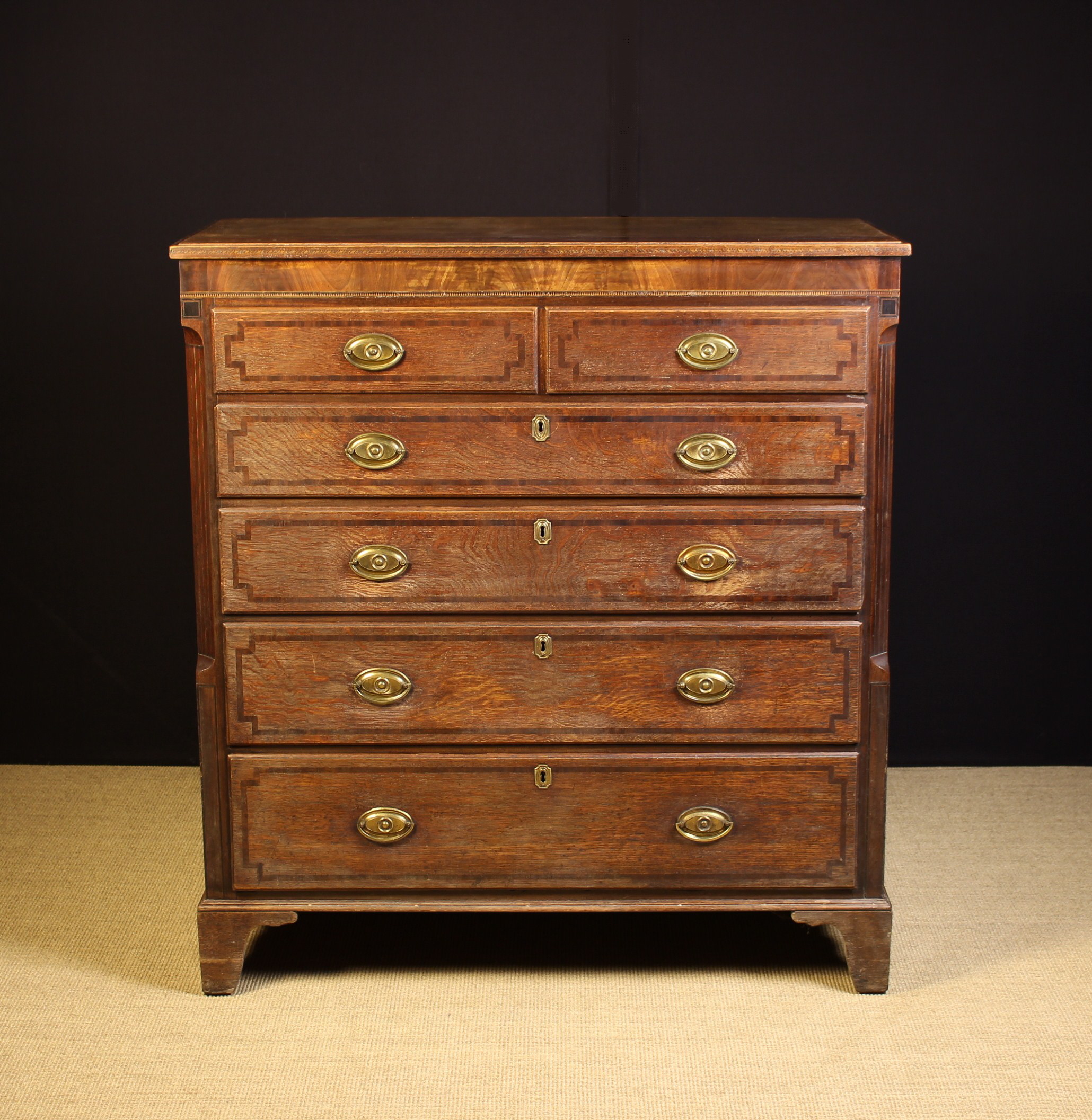 A Large Georgian Inlaid Oak Chest of Drawers.