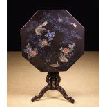A Black Lacquered Mother-of-pearl Inlaid Tilt-top Tripod Table.
