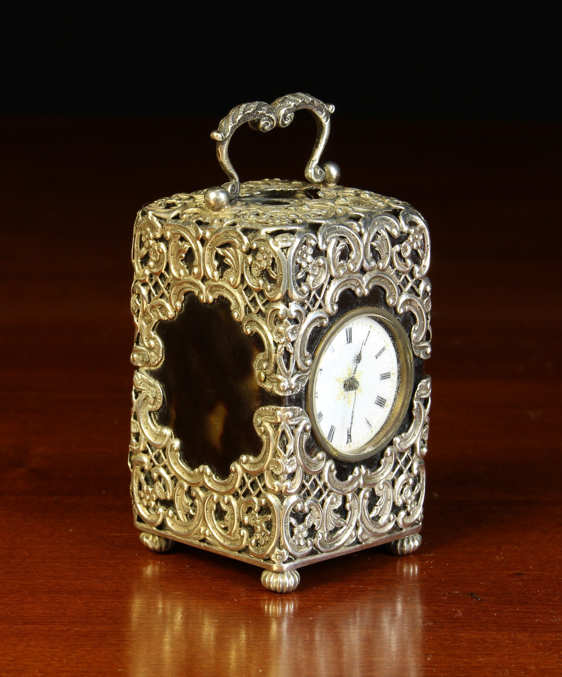 A Small Victorian Silver Mounted Tortoiseshell Carriage Clock with hallmarks for London 1893.