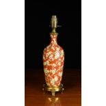 A Decorative Table Lamp with enamelled baluster vase base ornamented with a mass of prunus blossom