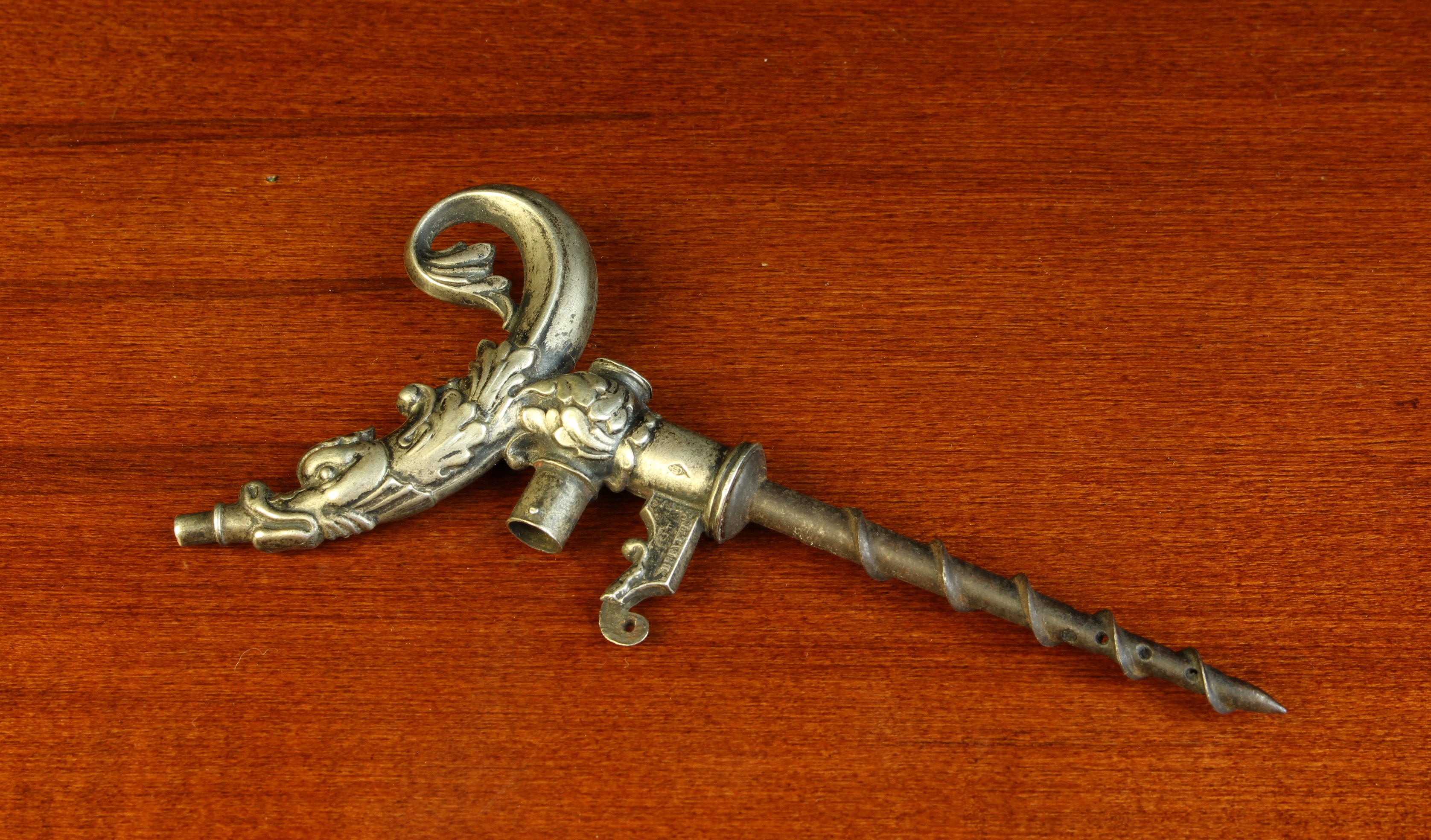 A French Silver Deleauze Champagne Tap with lever-pump action (lacking lever) having a foliate