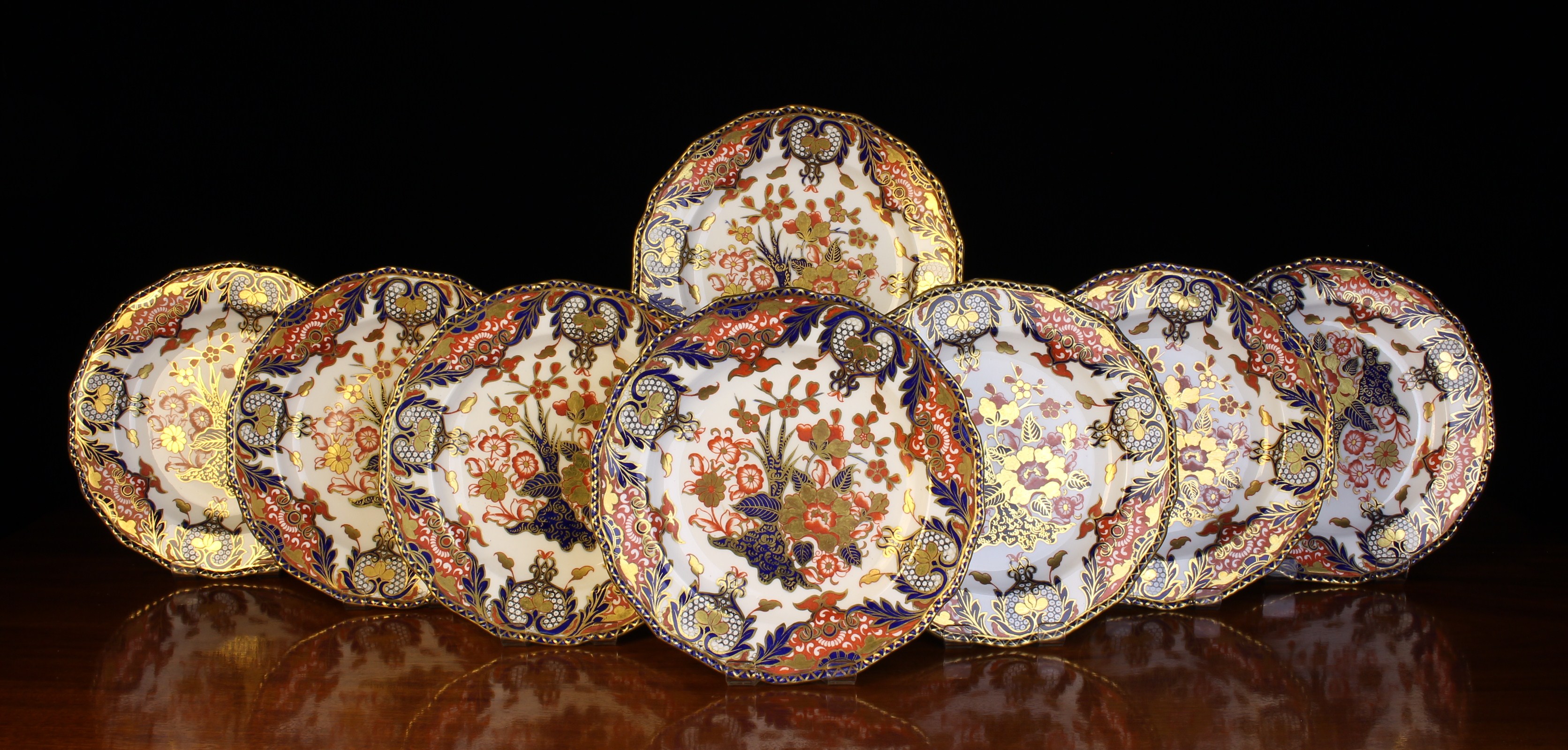 A Set of Eight Royal Crown Derby Imari 'Kings' Pattern Plates, decorated with deep blue,