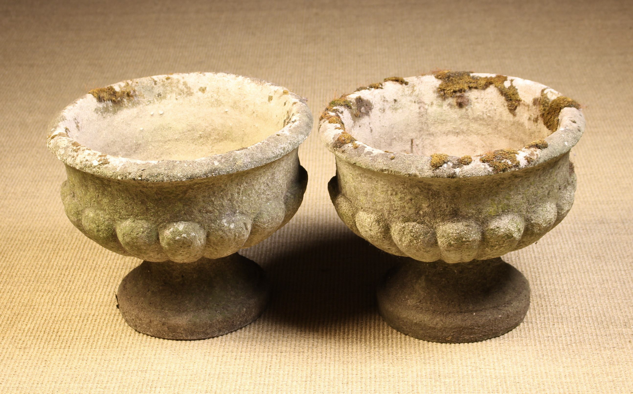 Two Composite Stone Garden Urns.