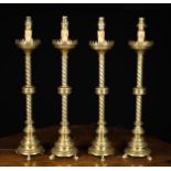A Set of Four Brass Neo-Gothic Style Pricket Sticks converted to electric side lamps.