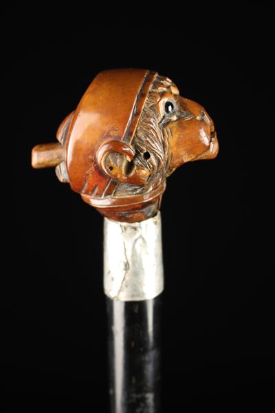 An Edwardian Silver-banded Ebonised Walking Stick with articulated Monkey's head handle. - Image 3 of 7