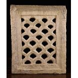 An 18th Century Architectural Pierced Stone Ventilation Grill carved with curved repeats,