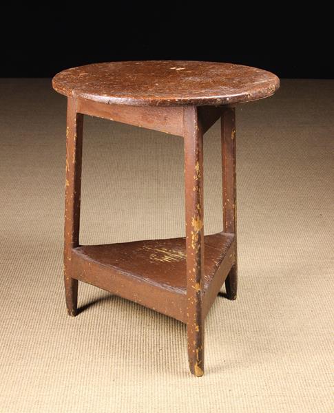 An Early 19th Century Wood-grained Pine Cricket Table.