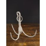 An Antique Hand Forged Iron Three-pronged Anchor, or Grappling Hook, with ring to the looped end,