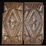 A Pair of 17th Century Oak Panels carved with lozenge motifs infilled with foliage with further