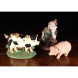 A Painted Vintage Moulded Composite & Card Pig with pull-off head accessing a container within,