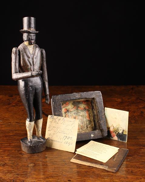 A Fabulous & Rare 19th Century Sailor-carved & Painted Figure of a Black Gentleman depicted with