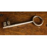 A Medieval Iron Key 6" x 2" (15 cm x 5 cm).